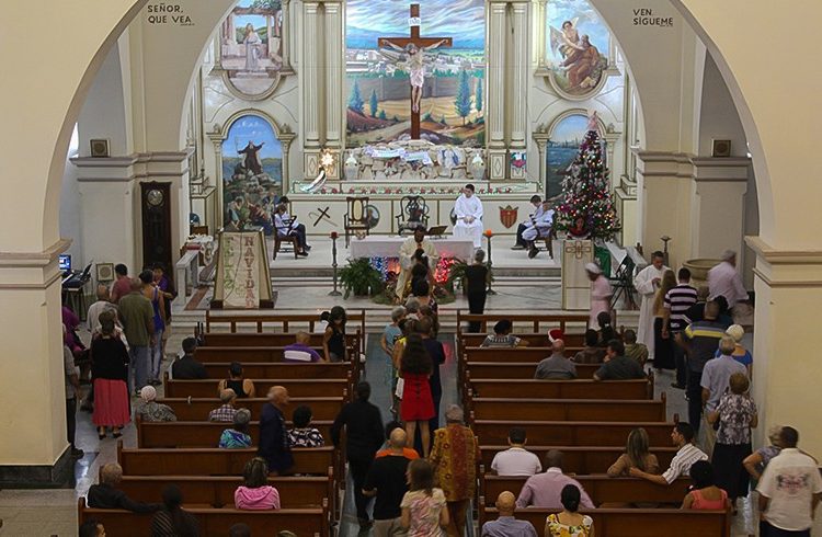Parishioners take communion at Mass / Photo courtesy of the author
