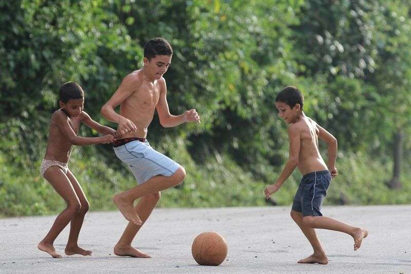 Life in the country isn’t easy. “You have to work a lot,” Arcadia Verdecia said. But it’s “beautiful, peaceful, agreeable.” Soccer grew in popularity in Santo Domingo and many other towns after the Cuban government broadcast World Cup matches in 2014. Photo: Tracey Eaton
