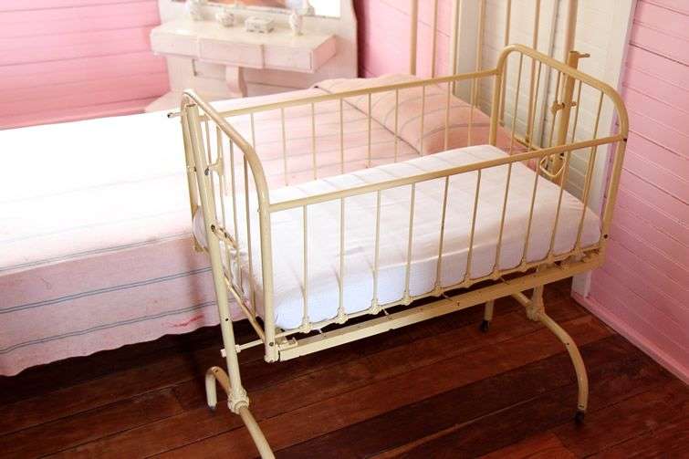 Fidel Castro was the third of seven children. All seven slept in this crib after their birth. Photo: Tracey Eaton