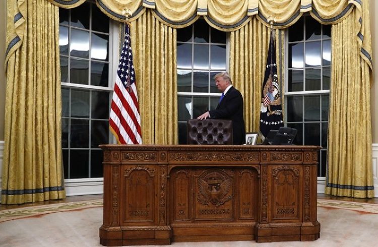 Donald Trump in the White House Oval Office. February 2017. Photo: Carolyn Kaster / AP.