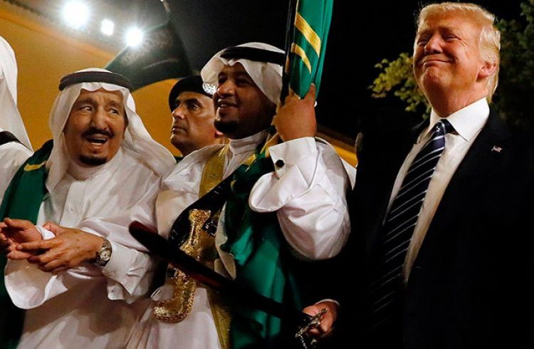 Trump in the traditional sword dance with the King of Saudi Arabia. Photo: Jonathan Ernst / Reuters (Detail).