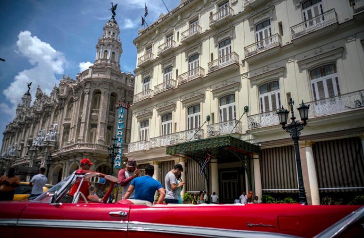 An old U.S. car parked in front of Havana’s Inglaterra Hotel, Saturday 17, 2017. Photo: Ramón Espinosa / AP.