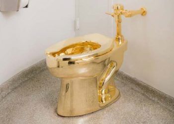 The 18-karat toilet titled “United States” is a criticism by Maurizio Cattelan of the nation’s greedy instincts.