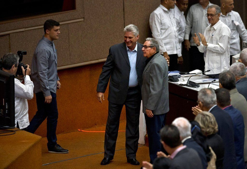 Cuban President Miguel Díaz-Canel and former President Raúl Castro pose for a photo before the start of a session to discuss the draft of a new Constitution at the Havana Convention Center. Photo: Ramón Espinosa / AP.