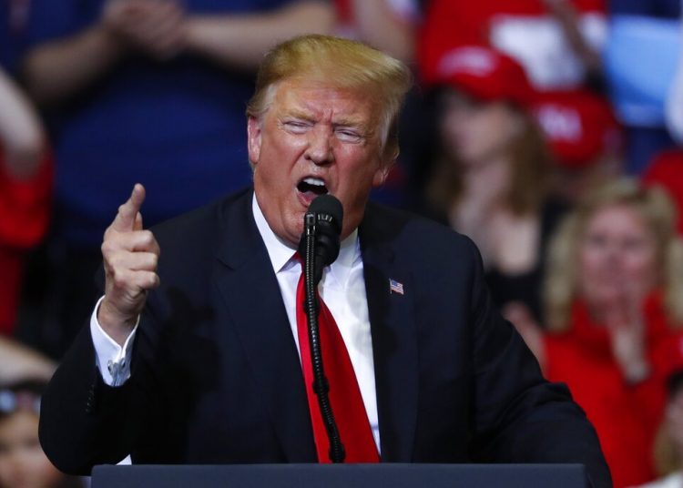 In this photograph of March 28, 2019, President Donald Trump speaks during a rally in Grand Rapids, Michigan. Photo: Paul Sancya / AP.
