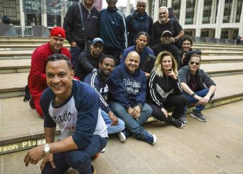Members of Los Van Van band, with the leader of the group Samuel Formell, at the front, pose at the Lincoln Center in New York on Tuesday, June 25, 2019. Photo: Bebeto Matthews / AP.