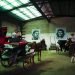 Horse-drawn carriages used to give tours to tourists, parked in the garage of a cooperative, under the murals of Fidel Castro and Ernesto "Che" Guevara, in Havana, Cuba. Photo: Ramón Espinosa / AP.