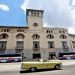 Several cars pass in front of the Havana cruise terminal. Photo: Ernesto Mastrascusa / EFE.