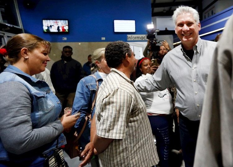 Cuban President Díaz-Canel greeting people at the bus terminal in the province of Sancti Spíritus. Photo: Ernesto Mastrascusa/EFE.
