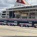 Buses in front of the British cruise ship MS Braemar, with five confirmed cases of COVID-19, for the transfer of its passengers after it docked on the morning of this Wednesday, March 18, 2020 in the port of Mariel, west of Havana. Photo: ACN / Facebook.