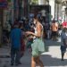 People on a street in Havana, during the current outbreak of COVID-19. Photo: Otmaro Rodríguez.