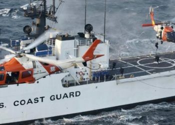 A Coast Guard cutter and two helicopters during an operation in the Caribbean. Photo: USCG