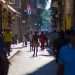 People walk in the sun on Obispo Street in Havana. Photo: Otmaro Rodríguez.
