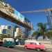 Cars drive by hotels under construction and others already open, in Havana, in August 2022. Photo: Ernesto Mastrascusa/EFE.