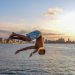 Young man jumps into the sea from the wall of Havana's Malecón