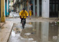 Man rides a bicycle in Havana