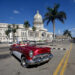 A vintage car waiting for tourists near the National Capitol in Havana. Photo: Otmaro Rodríguez.