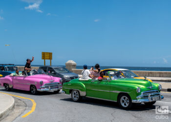 Vintage cars in Havana. Tourism in Cuba.