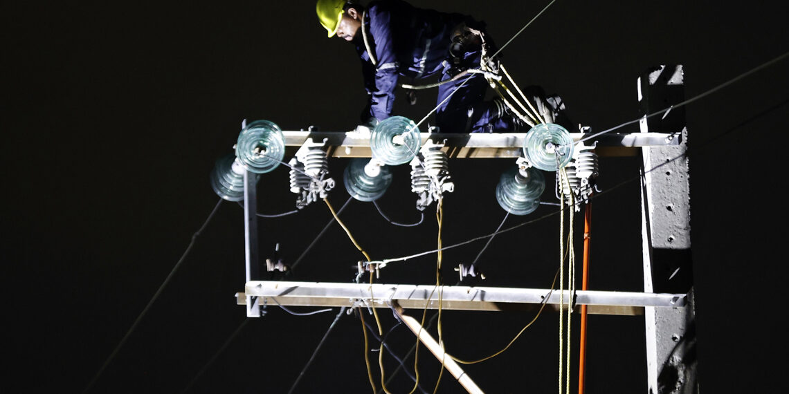 Electric Power System: Cuban electrician in a blackout in Cuba