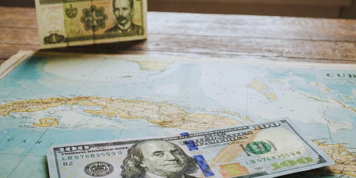 Dollar and Cuban peso. Dollarization