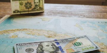 Dollar and Cuban peso. Dollarization