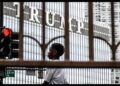 Black child in front of Trump Tower
