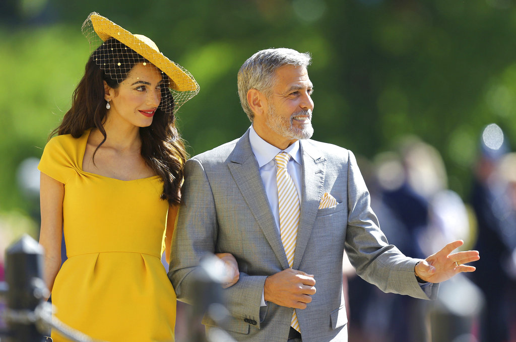 Amal Clooney y George Clooney llegan a la boda del príncipe Enrique y Meghan Markle en la Capilla de San Jorge, en el Castillo de Windsor, el sábado 19 de mayo del 2018. (Gareth Fuller/pool photo via AP)