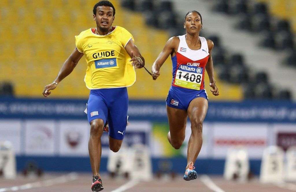 La campeona paralímpica cubana Omara Durand y su guía Yunior Kindelán. Foto: ESPN.