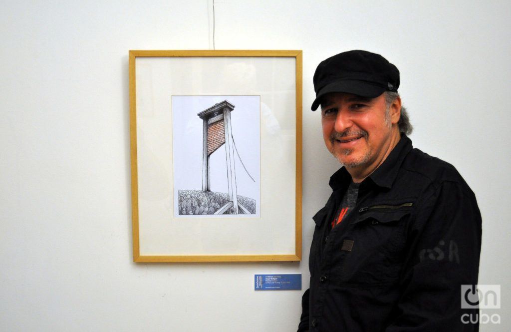 Ángel Boligán ante su obra premiada El muro de Trump, en la 19 edición del PortoCartoon World Festival. Foto: Francisco Puñal Suárez.