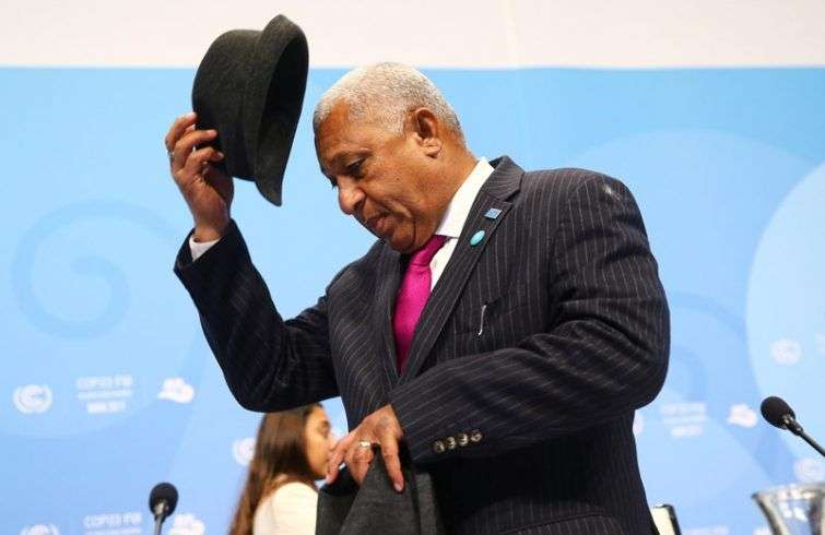El primer ministro de Fiyi, Frank Bainimarama, al llegar a la última sesión de la Conferencia sobre Cambio Climático 2017 de la ONU, presidida por Fiyi y llevada a cabo en Bonn, Alemania, hoy. Foto: Wolfgang Rattay / Reuters.