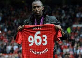 Usain Bolt es seguidor del Manchester United. Foto: Efe.