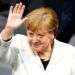 Angela Merkel saluda tras su elección para un cuarto mandato como canciller en el Bundestag, el Parlamento alemán, en Berlín, Alemania, este 14 de marzo de 2018. Foto: Gregor Fischer / DPA vía AP.