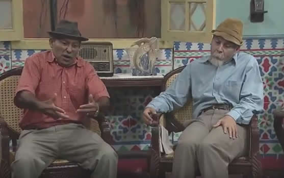 Fotograma de Vivir del Cuento. Chacón y Pánfilo conversan.