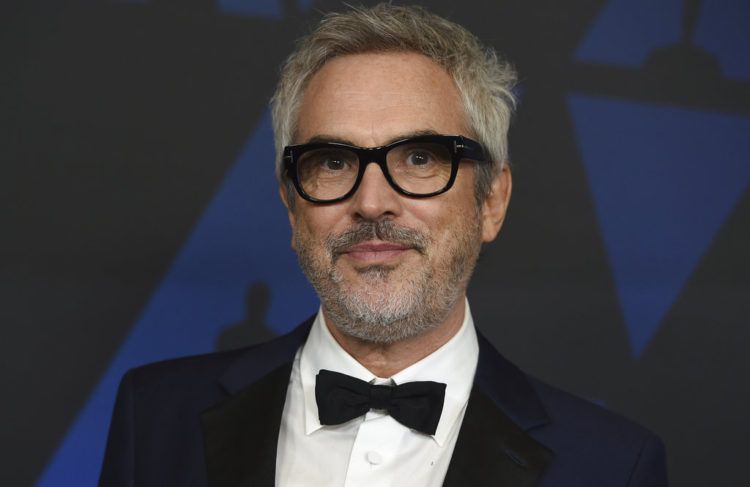 El director mexicano Alfonso Cuarón resuena nuevamente como un favorito en los Oscar y este domingo compite por tres Globos de Oro. Foto: Jordan Strauss / Invision / AP / Archivo.