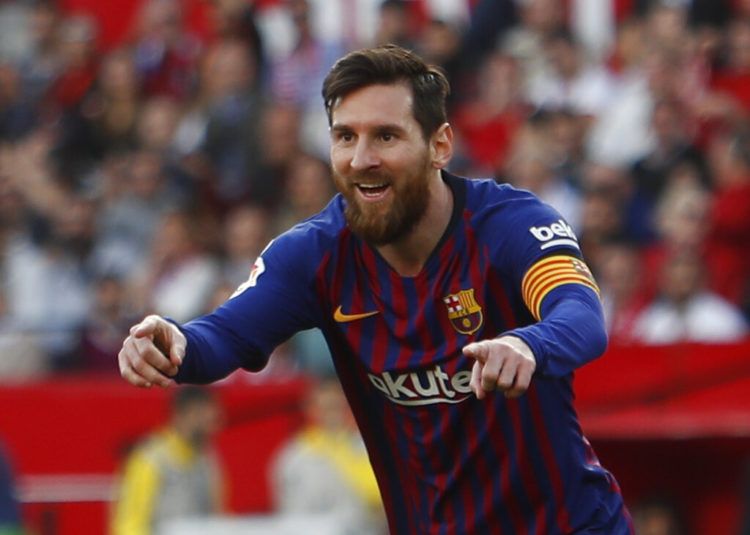Lionel Messi festeja tras anotar el segundo gol del Barcelona en el partido ante Sevilla en la Liga española, en Sevilla, el sábado 23 de febrero de 2019. Foto: Miguel Morenatti / AP.