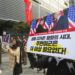 Manifestantes surcoreanos con pancartas que muestran fotos del presidente Donald Trump y del líder norcoreano Kim Jong Un durante una manifestación en Seúl, Corea del Sur, para denunciar las políticas de Washington sobre Corea del Norte. Foto: Ahn Young-joon / AP.