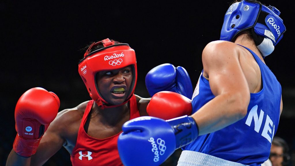 USA's Claressa Shields (left) fights against Netherlands' Nouchka Fontijn at the Rio 2016 Olympic Games.