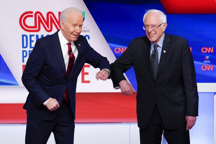 Joe Biden y Bernie Sanders en el debate demócrata el 15 de marzo del 2020 en Washington. Foto: AP/Evan Vucci.