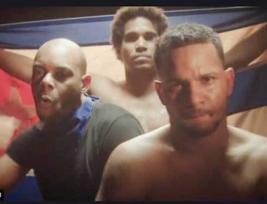 Still from the Patria y Vida video clip in which Maykel Osorbo appears (right) together with Funky and Luis Manuel Otero Alcántara.