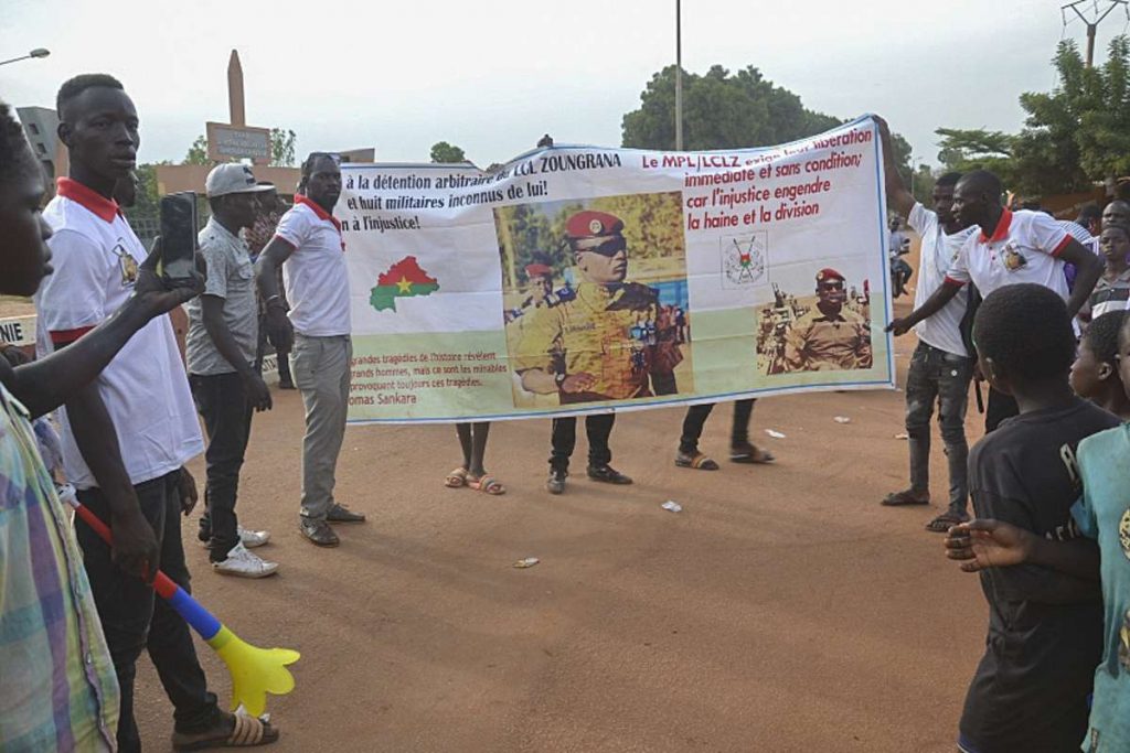 Gunshots and military helicopters fly over Burkina Faso on the second day of the coup