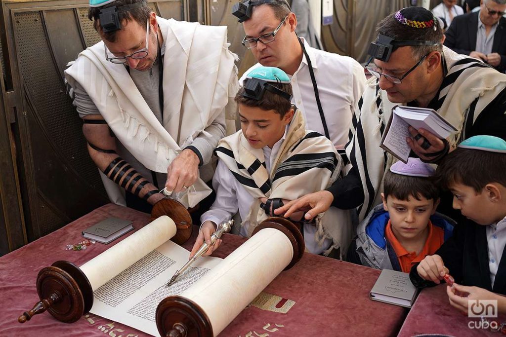Bar Mitzvah at the Wailing Wall scripture reading in ancient or biblical Hebrew