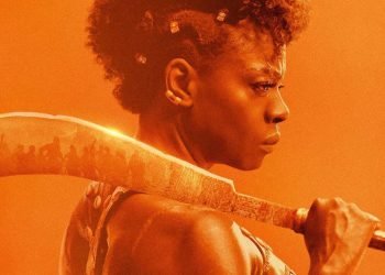 The Woman King filme de Netflix cartel mujer negra de perfil con machete