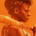 The Woman King filme de Netflix cartel mujer negra de perfil con machete