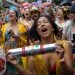 Miembros de la comparsa callejera 'Saia de Chita' celebran durante el domingo de carnaval en de la ciudad de Sao Paulo (Brasil). Foto: Isaac Fontana/EFe.