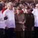 Diaz-Canel junto a  Raúl Castro durante la conmemoración del Día de la Rebeldía Nacional, en Santiago de Cuba. Foto: Ernesto Mastrascusa/EFE.