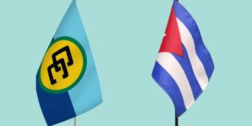 Banderas de Cuba y la Comunidad del Caribe (Caricom). Foto: @CARICOMorg / Archivo.
