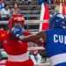 Combate por el título en la división de 57 kg entre Enisyeny Alba (de rojo) y Legnis Calá (de azul), ganado por esta última, en el primer campeonato nacional de boxeo femenino de Cuba. Foto: Otmaro Rodríguez.