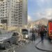 Bomberos trabajan en el exterior de un edificio alcanzado por ataques aéreos de Israel a Irán, el 13 de junio de 2025. Foto: Abedin Taherkenareh / EFE / EPA.