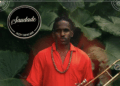 el negro toca trombón