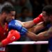 Los cubanos Enmanuel Reyes (rojo) y Loren Berto Alfonso (azul) ya se enfrentaron en los Juegos Olímpicos de París como representantes de España y Aazerbaiyán, respectivamente. Foto: Ali Haider/EFE/EPA.